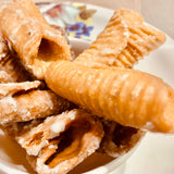 Andhra Godhuma Gottalu-Sweet Coated Wheat Crispy Rolls