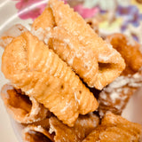 Andhra Godhuma Gottalu-Sweet Coated Wheat Crispy Rolls