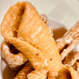 Andhra Godhuma Gottalu-Sweet Coated Wheat Crispy Rolls