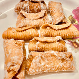 Andhra Godhuma Gottalu-Sweet Coated Wheat Crispy Rolls