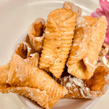 Andhra Godhuma Gottalu-Sweet Coated Wheat Crispy Rolls