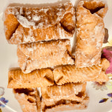 Andhra Godhuma Gottalu-Sweet Coated Wheat Crispy Rolls